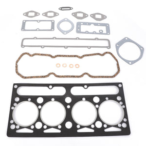 An array of engine gaskets and seals, including a head gasket, intake and exhaust manifold gaskets, among other seals in various shapes and sizes suitable for Massey Ferguson models, all arranged on a flat surface from the AGCO Joint/Gasket Kit - 4222920Z91.