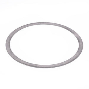 The AGCO Shim - F411301021100, a thin, flat, circular metal washer with a smooth surface, gleams gently against a pristine white background.