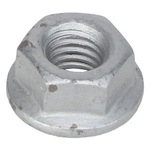 A close-up image of the AGCO Hex Flange Nut - Acw1027140 reveals its hexagonal shape and threaded interior, featuring slight surface blemishes and a grayish tint.