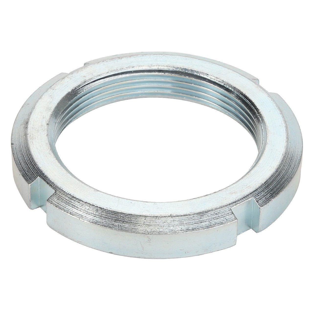 The AGCO Locknut - Acp0411060 is a silver metal threaded locknut featuring four evenly spaced indents around its outer edge. Further product description is not currently available.