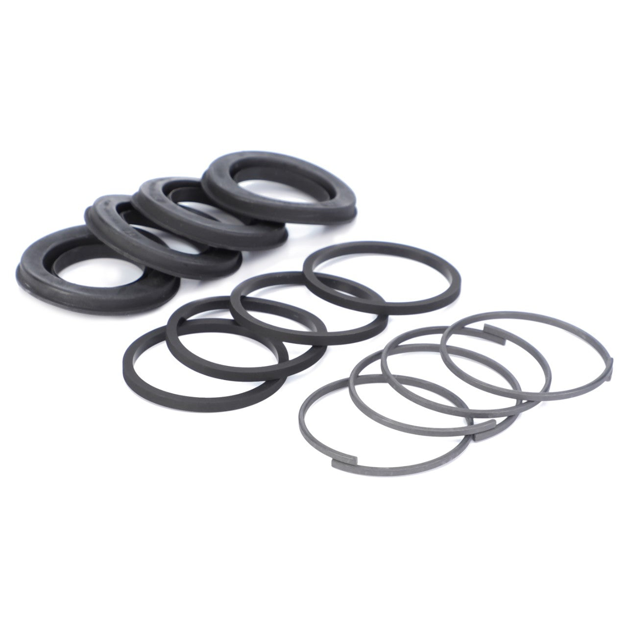 A set of black sealing rings and circular metal clips, arranged in two rows on a white background, suitable for use in Fendt models, included in the AGCO Repair Kit, Gaskets (Part No. F178107070080).