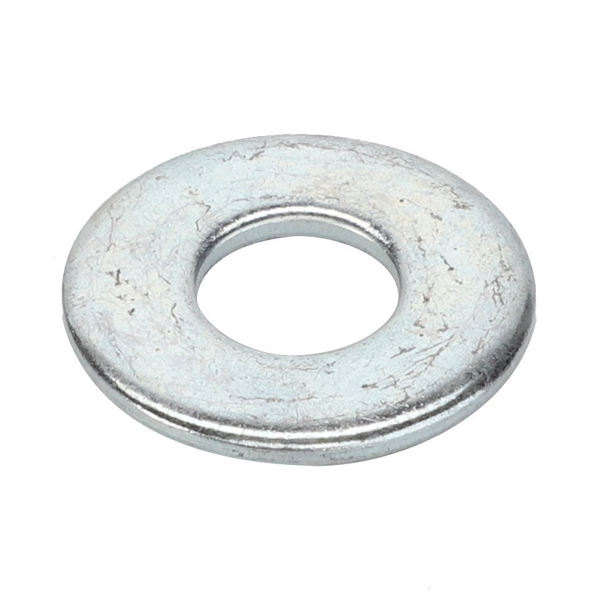 The AGCO Flat Washer - Acp0009340 is a flat, circular metal washer with a central hole, designed to distribute the load of a threaded fastener evenly.