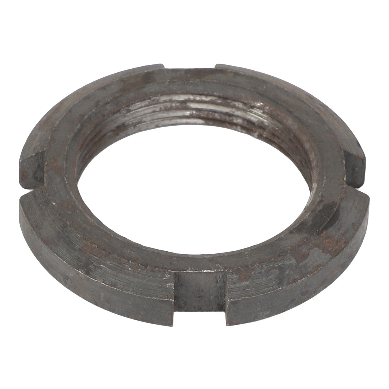 The AGCO NUT - 1132990 is a metal locking nut featuring four notches around its edge. No further product description is available.