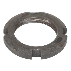 The AGCO NUT - 1132990 is a metal locking nut featuring four notches around its edge. No further product description is available.