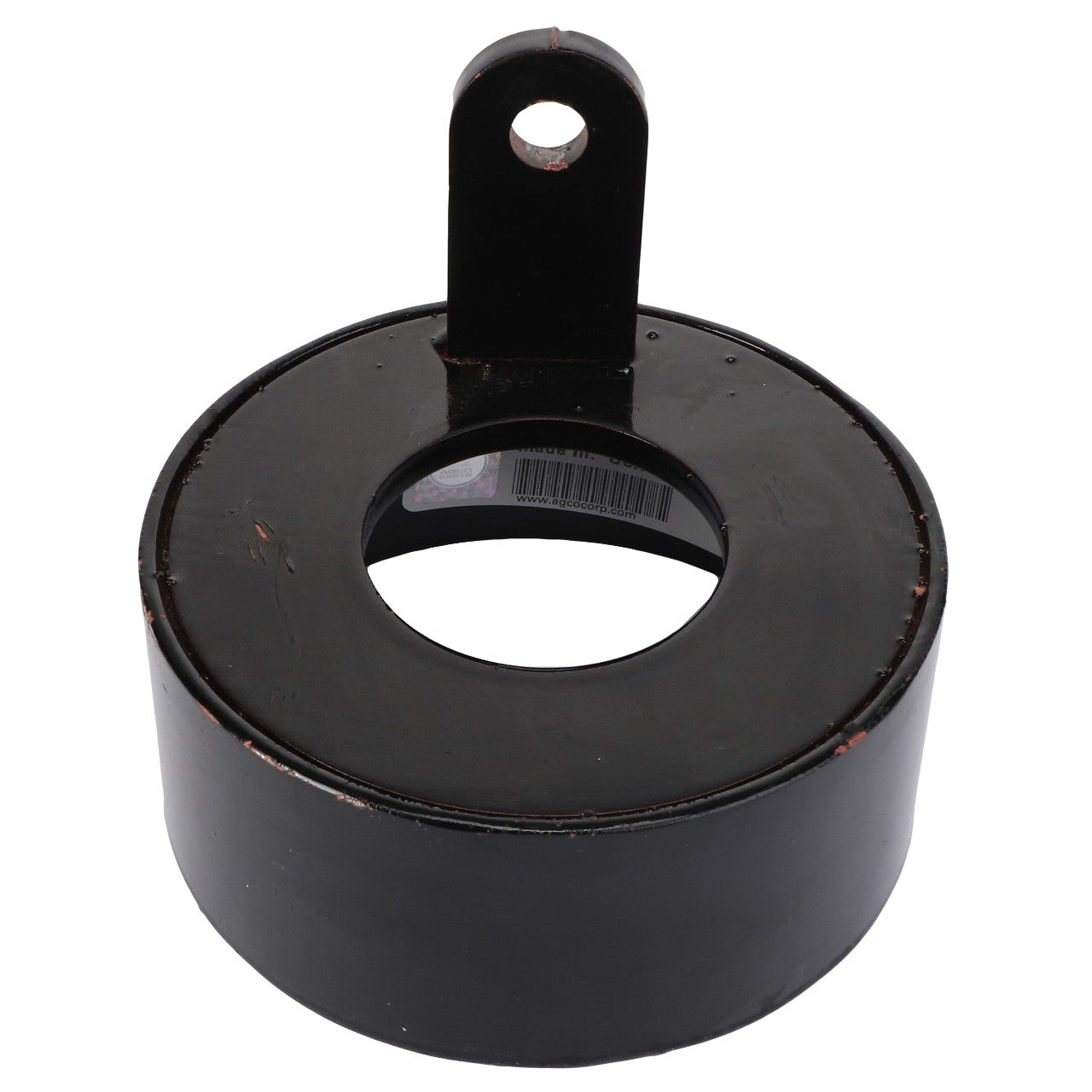 The AGCO Wheel Seal Protector - Sn16853 is a sleek black metal circular object with a central hollow section and an upper tab featuring a hole for convenient attachment.