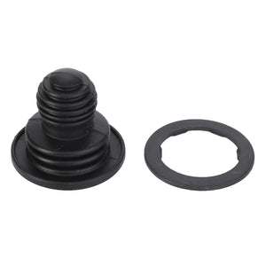 A black plastic AGCO drain plug, model AL60004085, complete with an O-ring gasket, both meticulously positioned against a white background. No current product description information is available for this item.