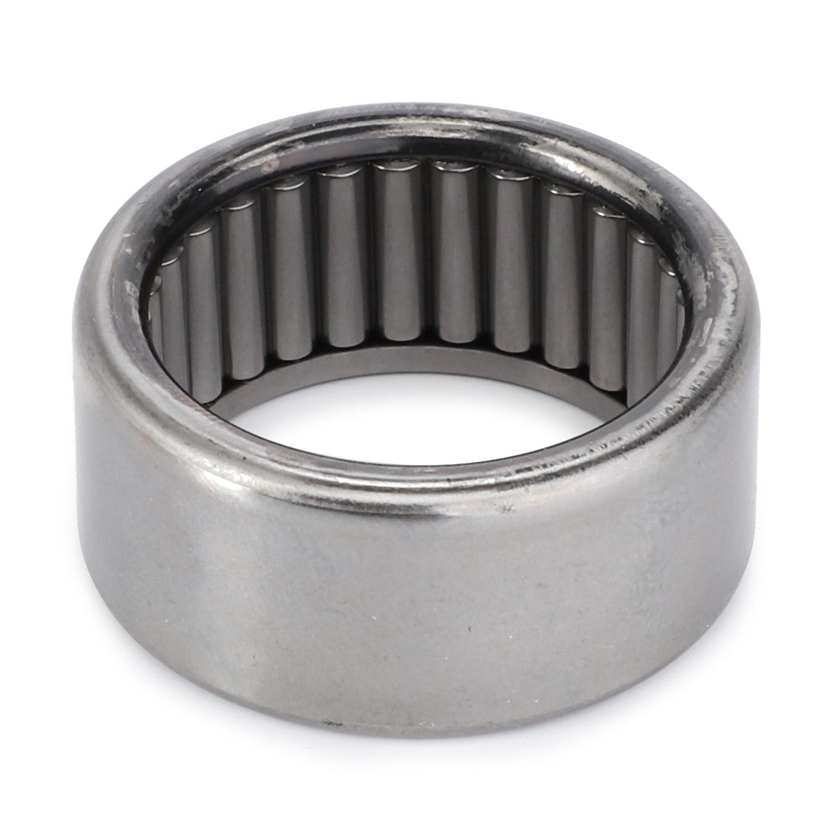 The AGCO Needle Bearing - 1677724M1 is a cylindrical metal bearing featuring numerous small cylindrical rollers arranged inside a smooth outer shell. This durable component is suitable for various applications, including Massey Ferguson models.