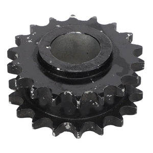 A black metal sprocket with visible wear and tear on its teeth, photographed on a white background. This product is an AGCO | Sprocket - Acx2433580 by the brand AGCO. No current product description information is available.