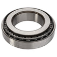 A close-up image of the AGCO | Taper Bearing - 3383714M1, showcasing its circular tapered roller bearing design with visible metal rollers and an inner and outer race, similar to those used in Massey Ferguson tractors.