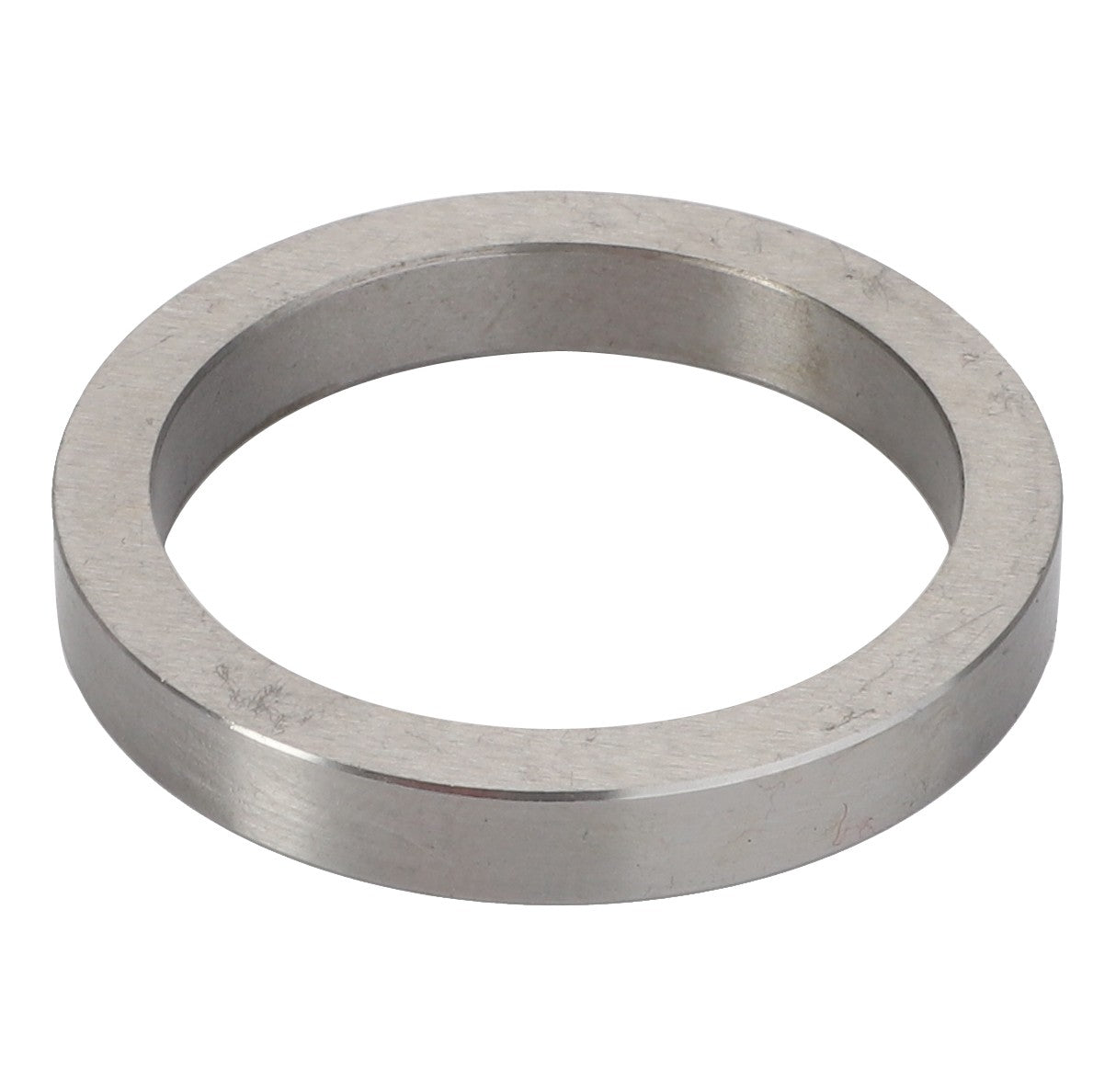 The AGCO | INTERMEDIATE RING - V30386900, a metallic circular washer featuring a substantial central hole, is depicted from an angled view against a plain white background. Detailed product description information is currently unavailable for this item.