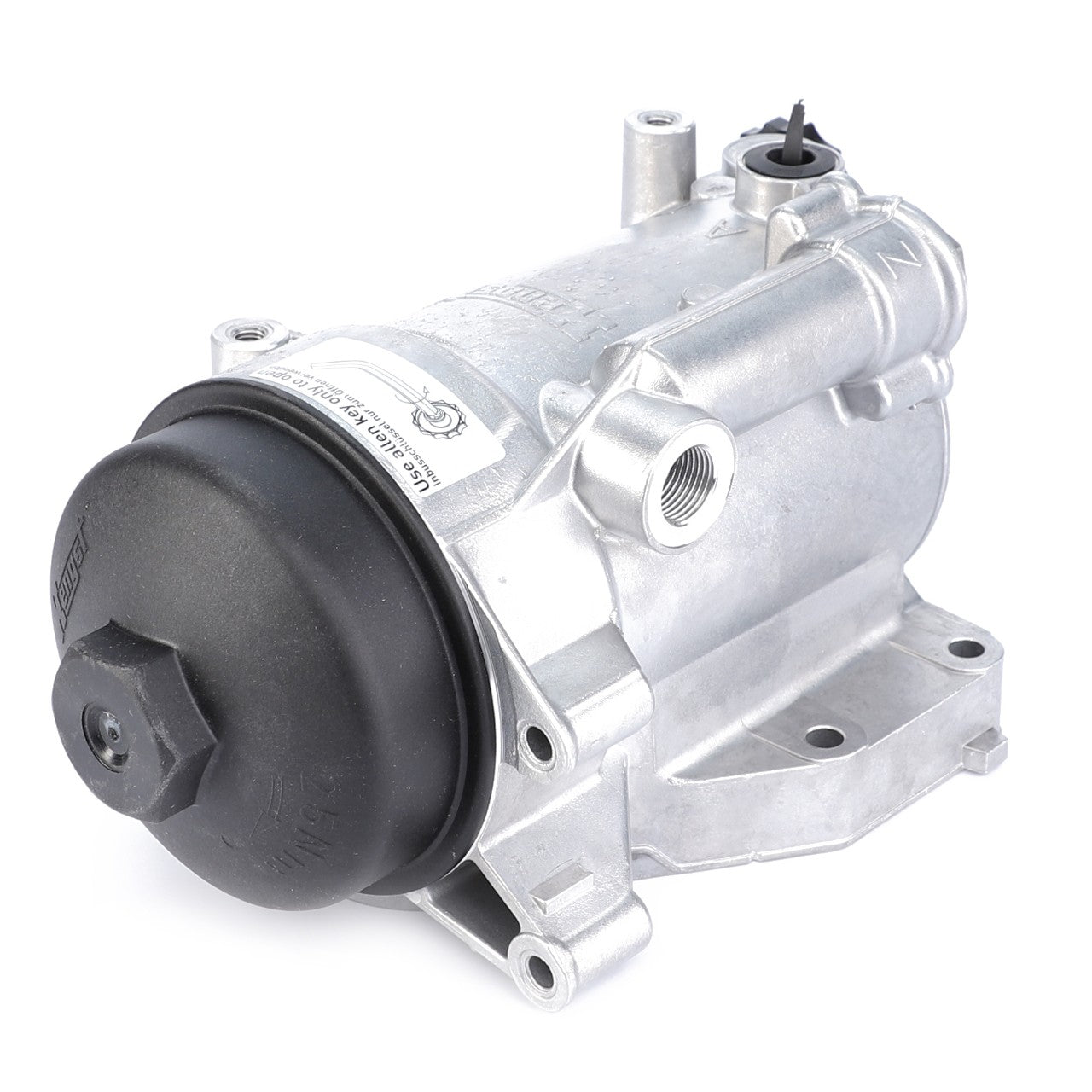 A silver electric motor with a black cover, two mounting brackets, and a connecting port on its side ensures optimal performance, much like the AGCO Fuel Filter Assembly - F530200710360 offering cleaner fuel with its spin-on design.