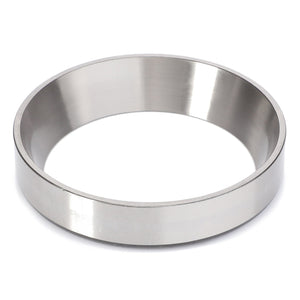 A polished, circular AGCO Bearing Cup - CH5P-9652 with a smooth surface, lying on a white background.