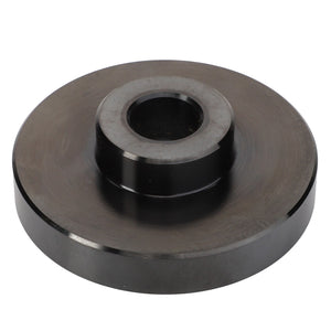 The AGCO | Tool - Acp0446480, a metal disc featuring a raised cylindrical center and a central hole, appears to be a specialized mechanical component. No current product description is available.