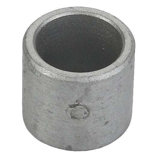 A close-up view of the cylindrical AGCO Spacer - Acx2818550, featuring a hollow center and a slightly rough exterior surface. No current product description information available at the moment.