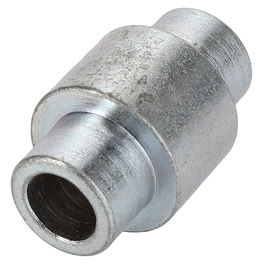 No current product description is available for the AGCO Spacer - Acp0293470, but here's a close-up of a metallic pipe fitting from AGCO. It has a cylindrical shape with threads on both ends for connection purposes. The fitting is silver in color and has a textured surface.