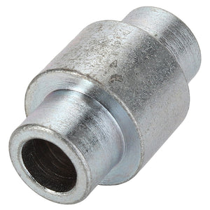 No current product description is available for the AGCO Spacer - Acp0293470, but here's a close-up of a metallic pipe fitting from AGCO. It has a cylindrical shape with threads on both ends for connection purposes. The fitting is silver in color and has a textured surface.