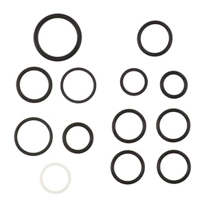 The AGCO SEALS KIT - AL5039046 features a collection of black rubber O-rings in various sizes, meticulously arranged in rows and includes one distinctive white O-ring. No current product description information is available.