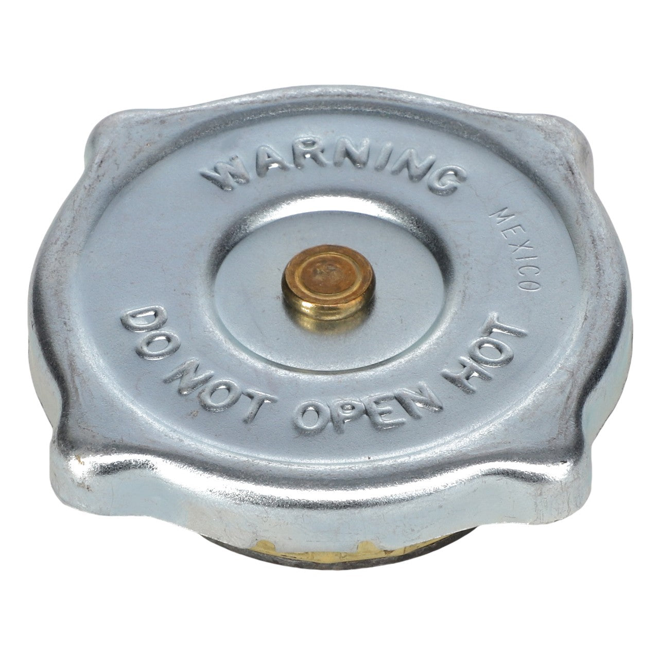 The AGCO | RADIATOR CAP - AG724582 is a metallic AGCO Genuine Radiator Cap with raised lettering that reads "WARNING MEXICO DO NOT OPEN HOT" on the top, designed to maintain cooling system pressure and prevent coolant boiling.