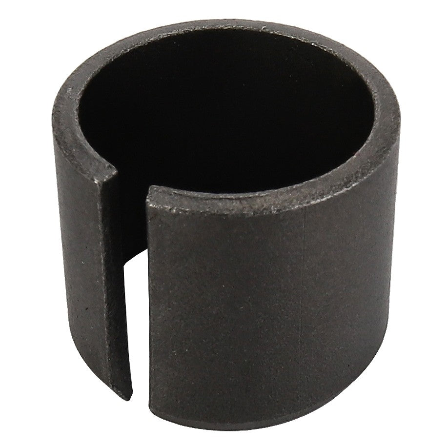 A black cylindrical metal object with a cut-out section, resembling a bushing or spacer. This item is the AGCO | Bush - Acw1043900 from the brand AGCO. No further product description information is available at this time.