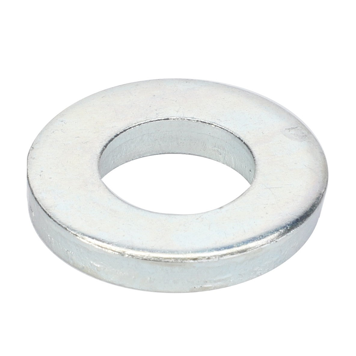 The AGCO BUSH - D28181284 is a silver-colored metal washer with a circular shape and a central hole, designed to distribute the load of a threaded fastener.