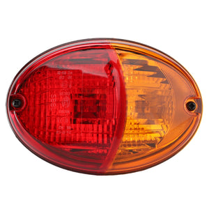 The AGCO | Combination Light, Rear - Acp0419060 by AGCO is an oval-shaped automotive tail light featuring a red lens on the left side and an amber lens on the right side, secured by two screws. Part of the AGCO Genuine Rear Lights range, it is celebrated for its reliability and durability.