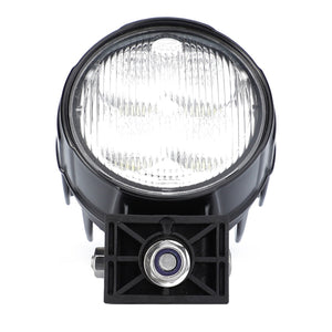 The AGCO | Work Light, Led - Acw224312A by AGCO is a round black automotive fog light with a clear lens and horizontal ridges, mounted on a rectangular base, designed to enhance visibility.