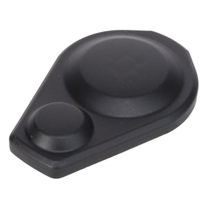 A black, teardrop-shaped plastic object with two circular raised sections, reminiscent of the sleek design seen in the AGCO Grease Cover For Front Loaders - Acp0298220.