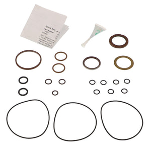 The AGCO SEAL KIT - AG714825, featuring an assorted set of O-rings, seals, a small tube of lubricant, and an instruction sheet, is carefully arranged on a light background. No current product description information available.