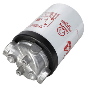 The AGCO Filter Head - Acw9147080, a cylindrical white oil filter from AGCO, features metallic fittings and cautionary text along with symbols that provide essential information on its surface.