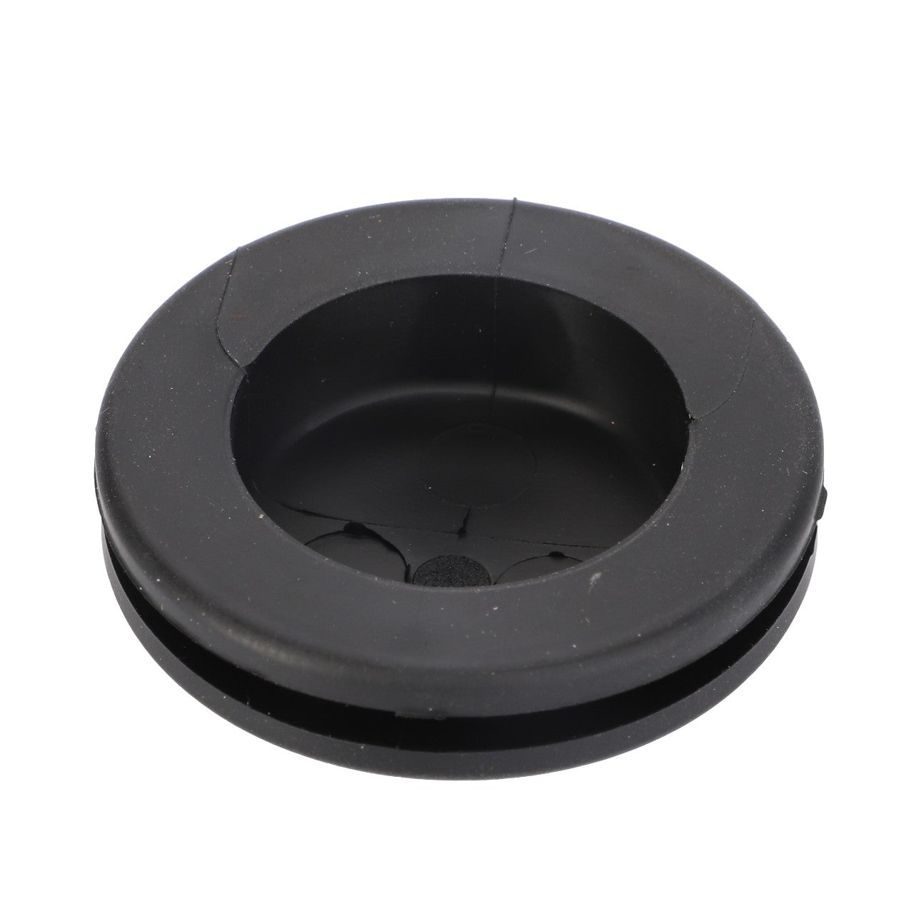 A black plastic plug with a central hole and slight wear marks, compatible with various Valtra Models, branded as AGCO | Plastic Plug - Acw0319830.