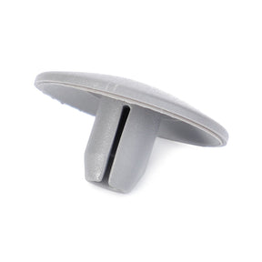 The AGCO | PLUG - V30627400 is a gray plastic clip featuring a flat, round top and two prongs on the bottom designed for secure insertion into a slot. No current product description information is available.