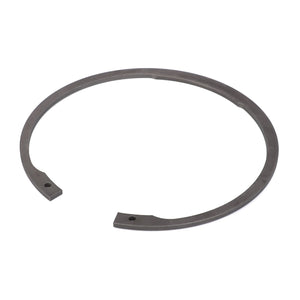 The AGCO Circlip - 3011258X1 is a round, metal snap ring with two open ends, compatible with both Fendt and Massey Ferguson models.