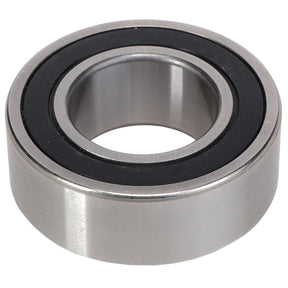 A close-up of the AGCO | BALL BEARING - AG334716, featuring a metallic structure with a black inner ring and a hollow center. No current product description information available.