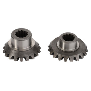 Two metallic bevel gears, identified as AGCO Bevel Gear - 0.008.7729.3, are displayed side by side on a plain white background. Both gears feature a toothed design and a central hole with a splined interior, ensuring smooth operation and consistent quality. Crafted as AGCO Parts Genuine Gears, they represent precision engineering at its finest.