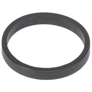 A close-up image of a simple, black circular ring, likely made of metal or plastic, lying flat on a white surface—reminiscent of the precision found in AGCO machinery, specifically the AGCO Flat Sealing Washer - 3016890X1.