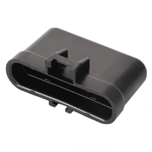 The AGCO Electrical Plug Cap - AG519698 is a black plastic connector featuring an oval shape and a clip on the top.