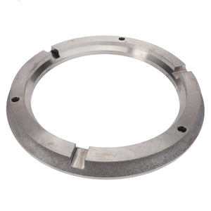 The AGCO Brake Plate - 3790013M4, a metal machine part featuring notches, holes, and a grooved outer edge, is likely designed for industrial use in Massey Ferguson models.