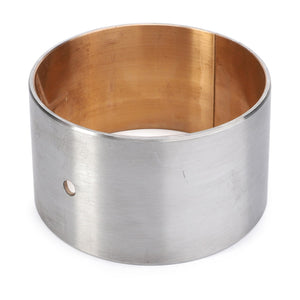 The AGCO | Bush - 3426028M2 is a cylindrical metal bushing with a smooth, polished exterior surface and a small hole on the side. Suitable for Valtra models, its interior appears to be copper-colored.