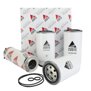 A set of AGCO brand filters and O-rings displayed in front of an AGCO-branded box. The image includes various cylindrical filters labeled with different part numbers, all part of the AGCO | Service Kit - Acp0525330. No current product description available.