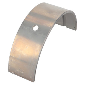 The AGCO Bearing Shell - Acp0357830 is a curved metallic component with a smooth surface and a circular hole near its center.