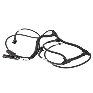 A coiled black automotive wiring harness, featuring multiple connectors and labels, branded as AGCO and designated as Harness - Acw2327730 for assured operating safety, is lying on a white background.