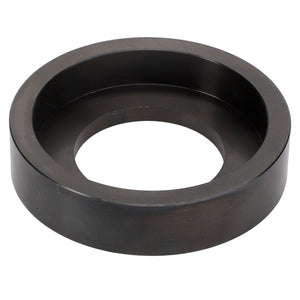 The AGCO Tool - Act0012370 is a circular, black metal object featuring a flat outer ring and a hollow center, similar in appearance to a large washer or gasket. No current product description is available for this part.