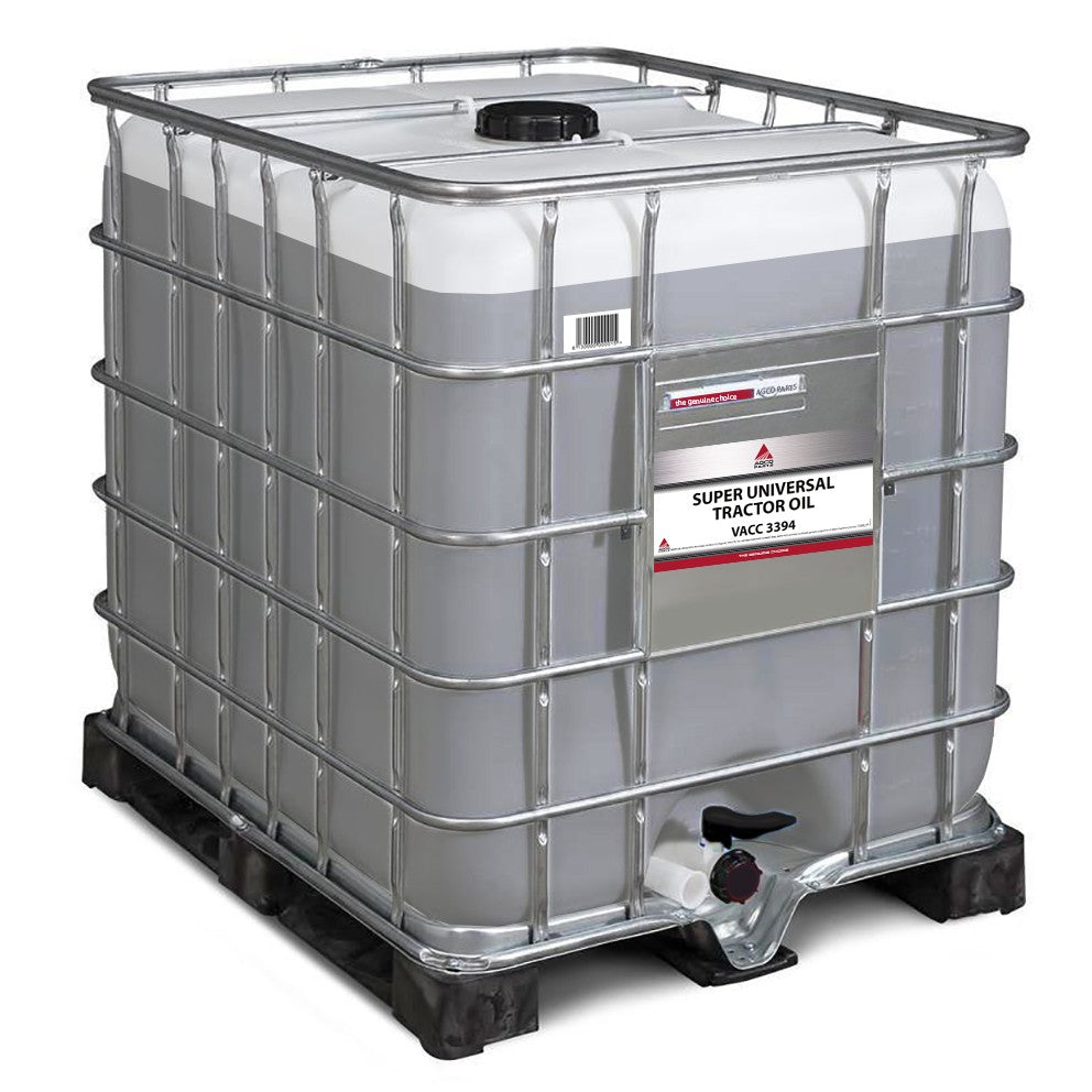 A large, square-shaped container with a metal frame filled with AGCO Parts Super Universal Tractor Oil 10W-30 (1000L - Vacc3394). This agricultural lubricant, branded by AGCO, has a label on the front and is placed on a plastic pallet.