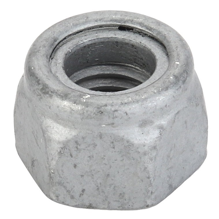 A close-up image of the AGCO | Hex Top Lock Nut - Acw1514890, featuring a threaded interior and an eight-sided exterior, commonly used for securing bolts in mechanical assemblies. No current product description information is available for further details.