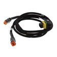 The AGCO Rotor Performance Wire Harness - Acx2458320, featuring multiple connectors and meticulously encased in black protective tubing, is set against a pristine white background.