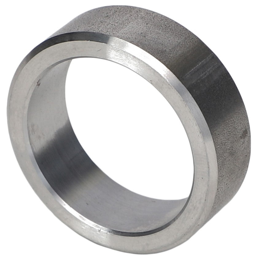 Here is a close-up of the AGCO | Walker Bearing Bushing - Acp0012090, featuring a metal cylindrical ring with a smooth interior and a textured exterior surface.