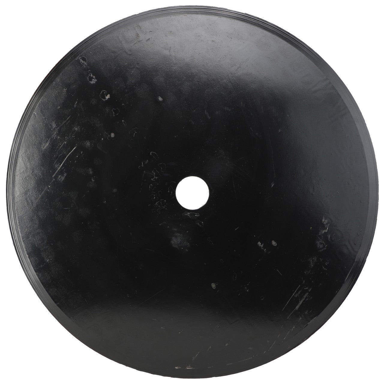 A black, round disc object with a hole in the center, likely made of metal or plastic, viewed from above, is featured in our product description: AGCO | COULTER BLADE - SN3273N from AGCO.