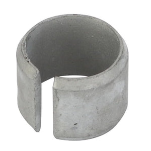 The AGCO Tensioner Bush - F119200210340 is a cylindrical metal ring with a slit opening, potentially used as a component part.