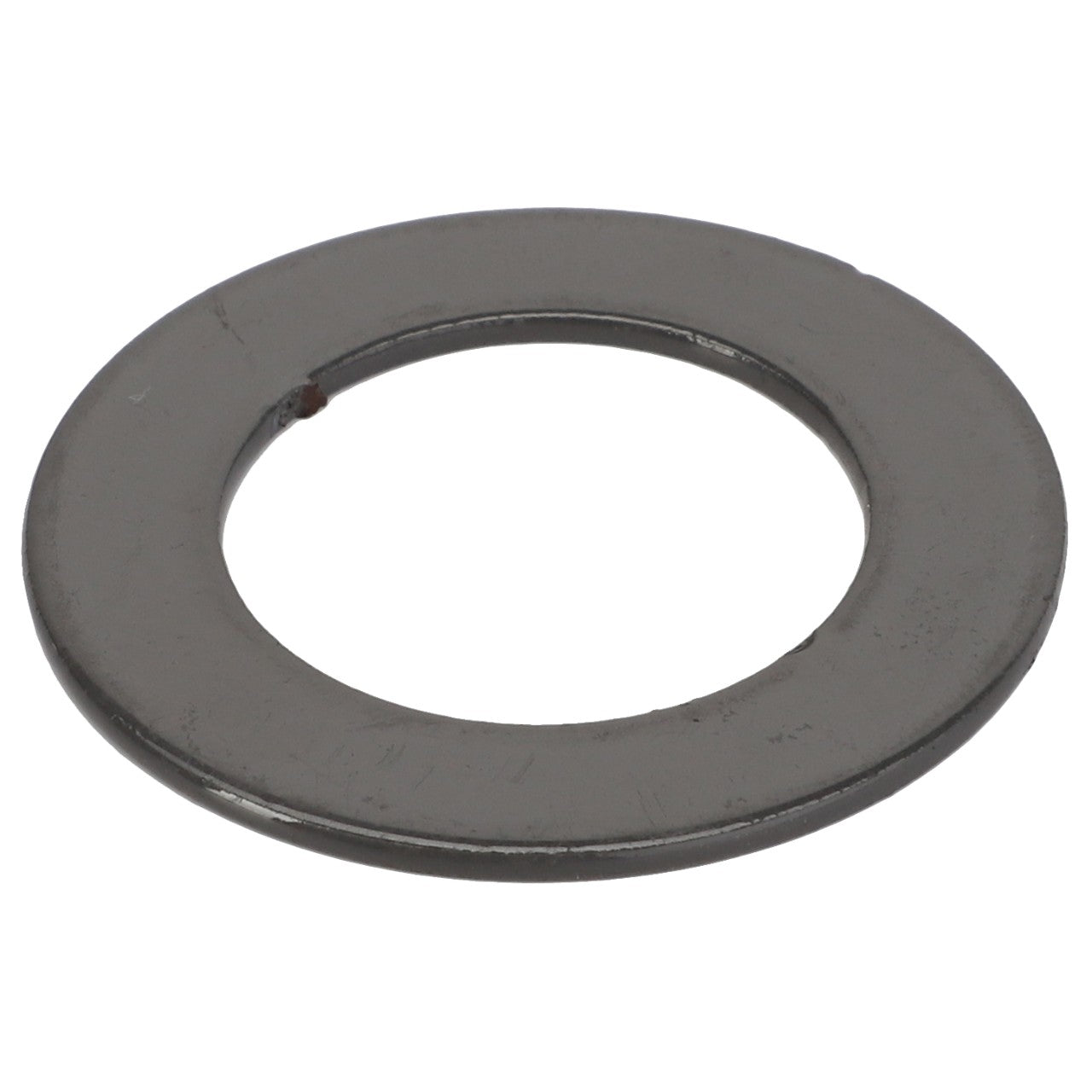 The AGCO Adjusting Shim ACY1217130 is a flat, round metal washer with a central hole, typically used to distribute the load of a threaded fastener.