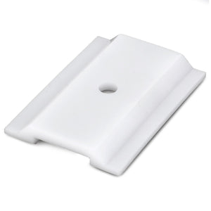 The AGCO | Guide - 4352997M2 is a rectangular white plastic bracket with a central circular hole, designed for durability and featuring two raised edges—making it perfect for use with Dyna-6 systems on your Massey Ferguson.